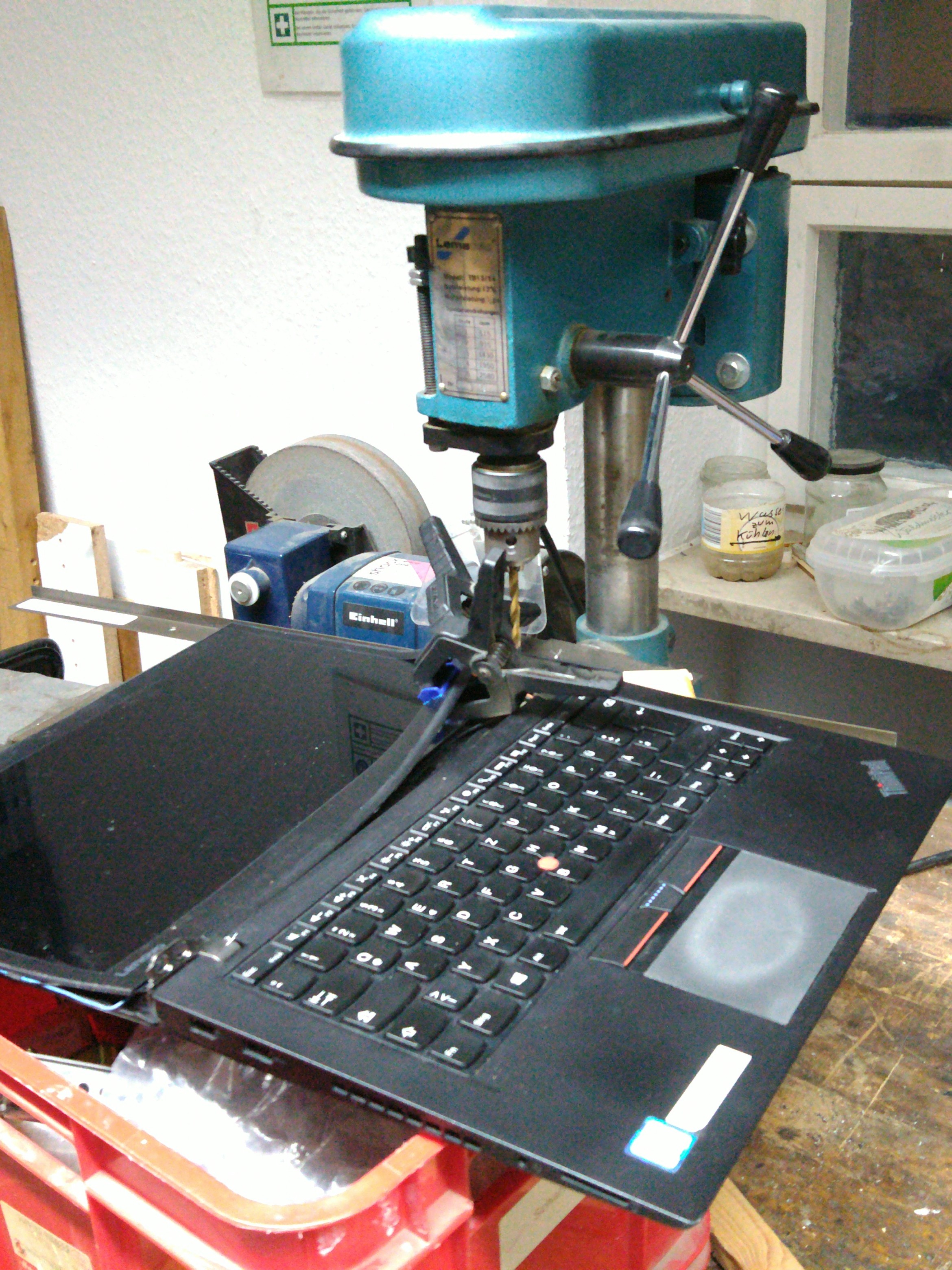 Lenovo ThinkPad T460s laying under drill in Shackspace
